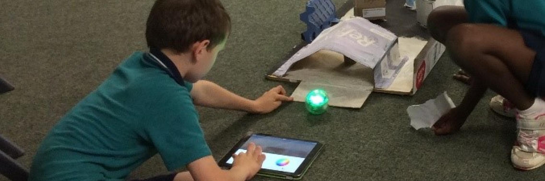 students using sphero on obstacle course