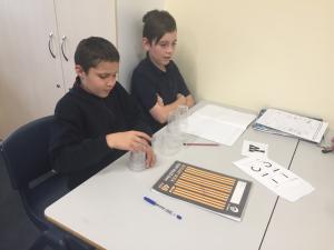 pretending to be cup stacking robots