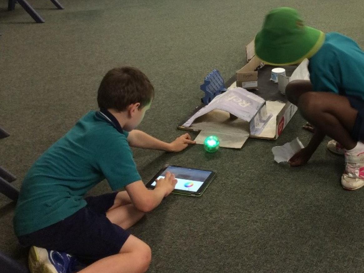students using sphero on obstacle course
